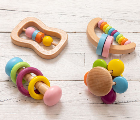 Das crianças musicais de madeira dos brinquedos de Soother 7.2cm do chocalho os instrumentos de madeira