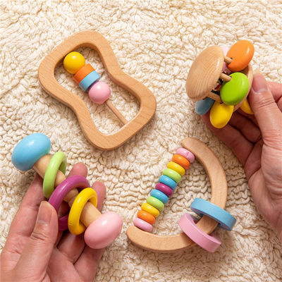 Das crianças musicais de madeira dos brinquedos de Soother 7.2cm do chocalho os instrumentos de madeira