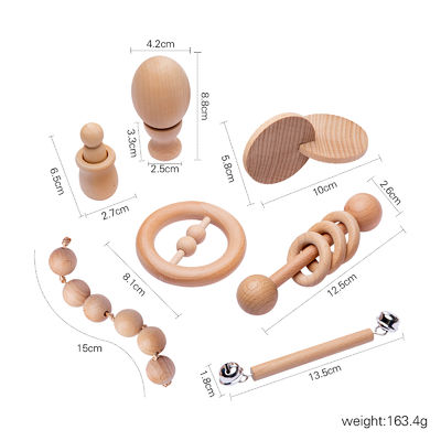 O gráfico chocalha 7Pc Teether de madeira para o anel saindo os dentes de madeira do bebê