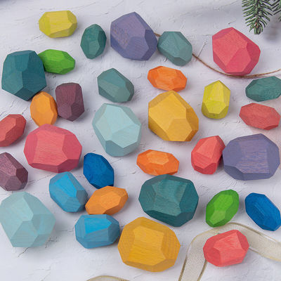 As pedras de madeira dos blocos de apartamentos do bebê das rochas 190g ajustam Montessori