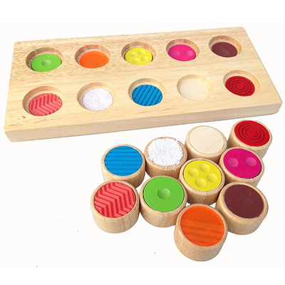 Treinamento sensorial/tátil de Montessori ajuda ao toque de harmonização da memória da cor do bebê