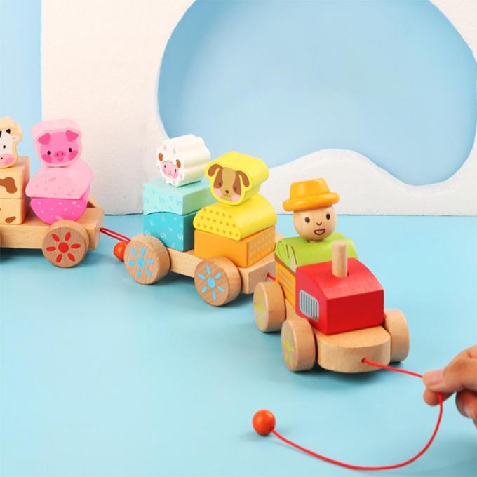 O caminhão de madeira do trem dá forma ao brinquedo educacional de DIY para crianças prées-escolar da criança